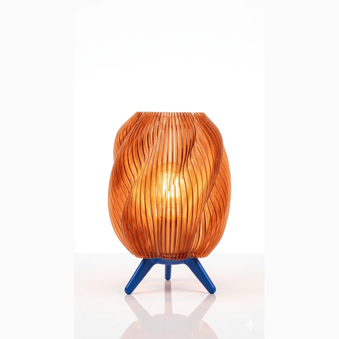 Burnt orange swirl lamp with blue tripod feet